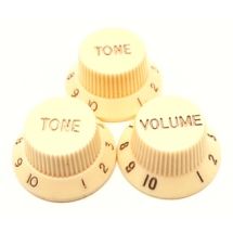 ST nuppisarja ivory 1 x volume 2 x tone kulta teksti